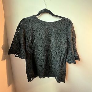 Nanette Lepore black lace top, half-sleeves.Perfect for office/casual. Size M.